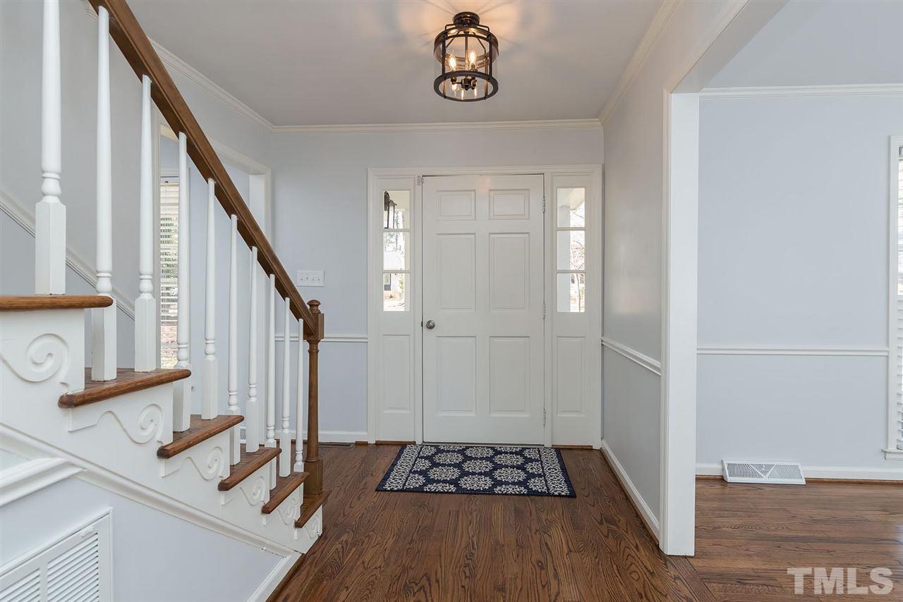 5828 Morning Forest Drive Raleigh, NC 27609 - Photo 12 of 25 a view of entryway with wooden floor