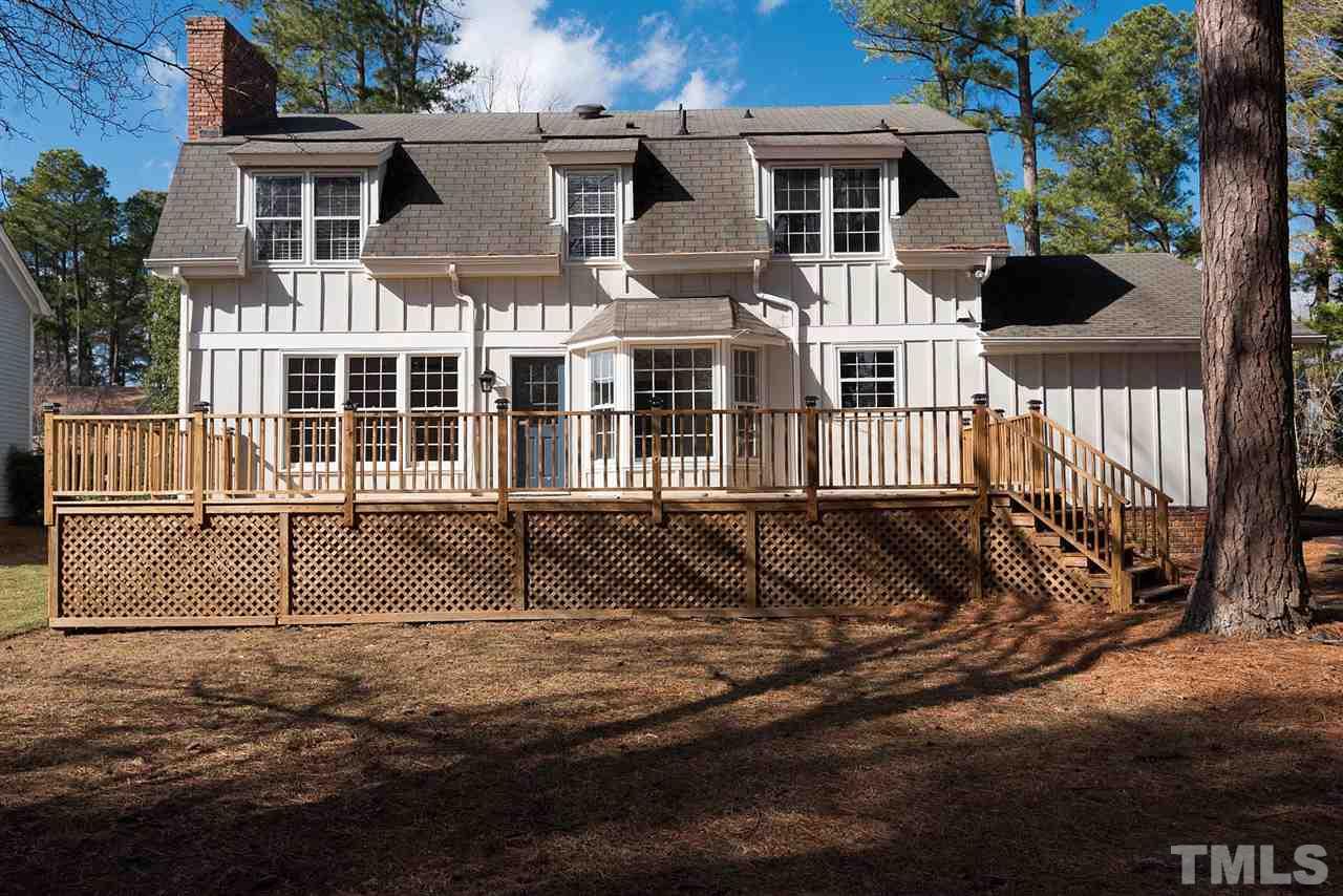 5828 Morning Forest Drive Raleigh, NC 27609 - Photo 24 of 25 a front view of a house with a yard