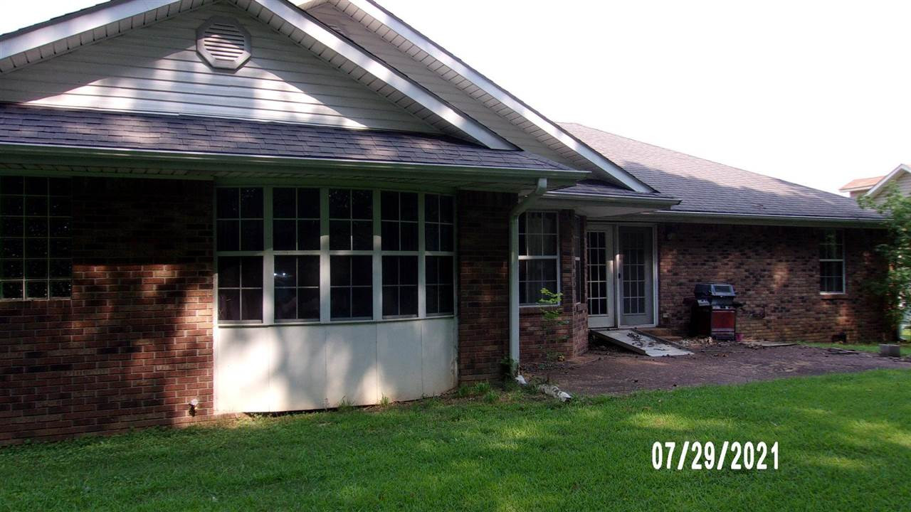 301 Jordan Street Ripley, TN 38063 - Photo 5 of 19 a view of a house with a yard porch and sitting area