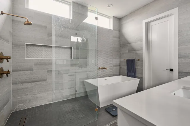 a bathroom with a sink and mirror