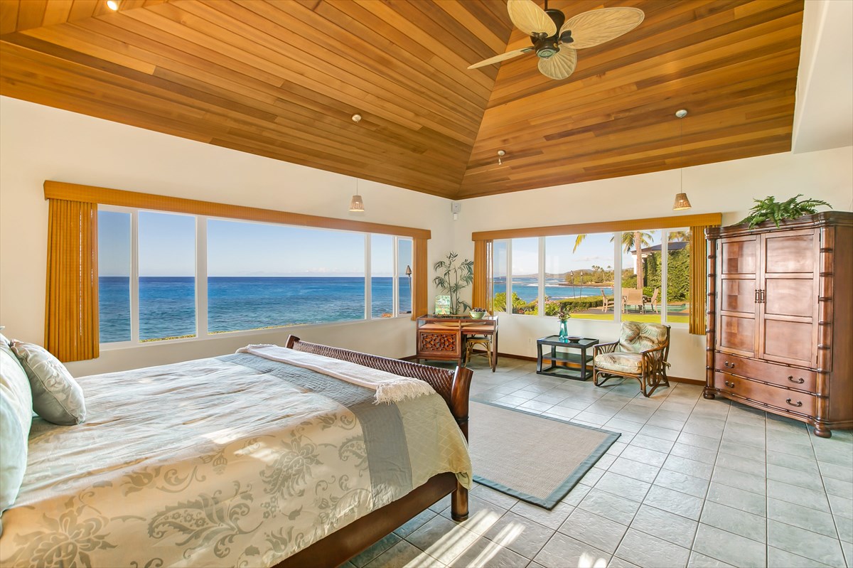 1811 Pe'e Road Koloa, HI 96756 - Photo 11 of 25 a bed sitting in a room next to a window