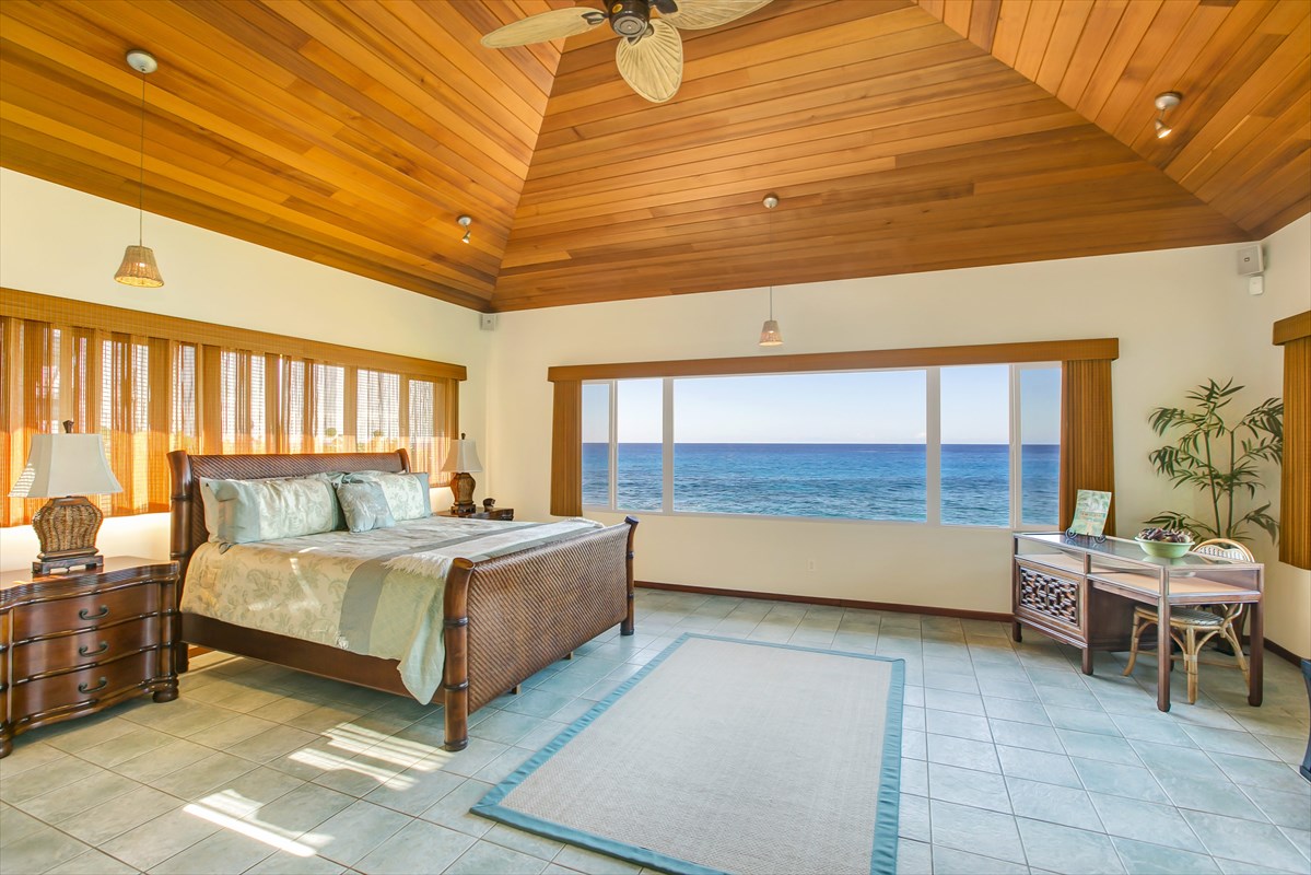 1811 Pe'e Road Koloa, HI 96756 - Photo 12 of 25 a living room with a bed furniture and a large window