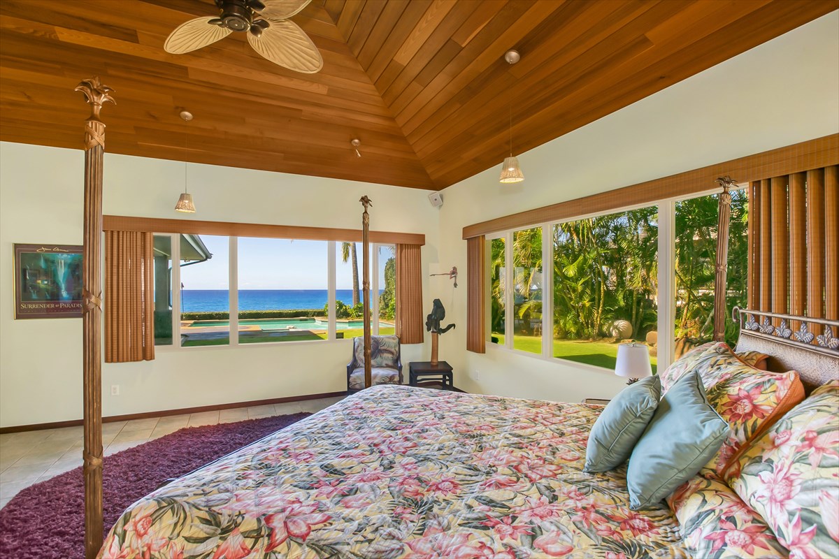1811 Pe'e Road Koloa, HI 96756 - Photo 14 of 25 a bed sitting in a bedroom next to a large window