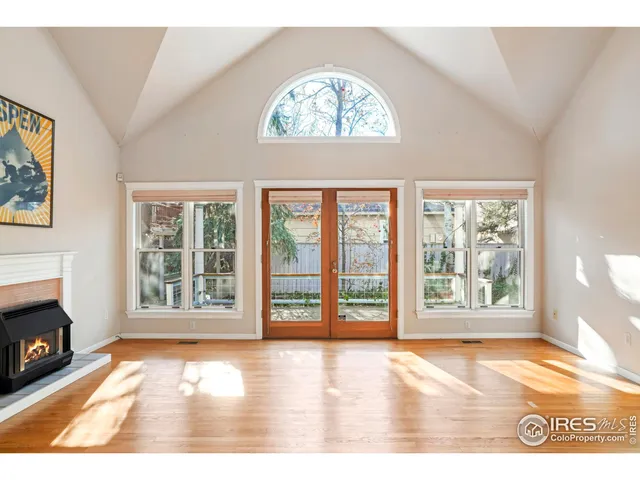 a view of a room with a large window