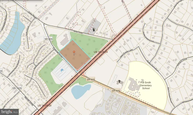 a close up of a white building with a palm tree