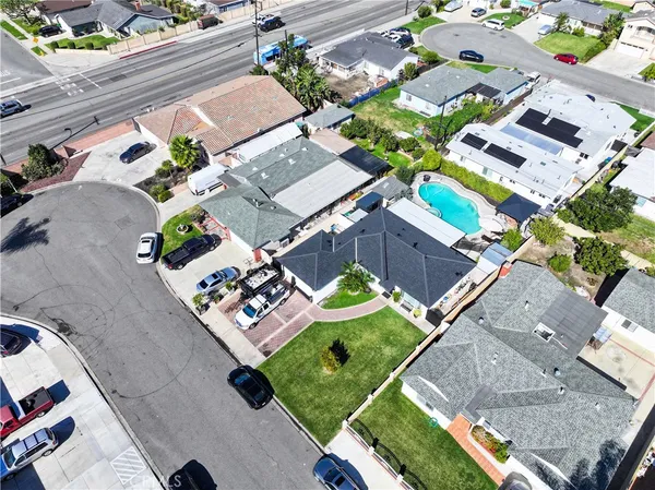 an aerial view of a house with a garden