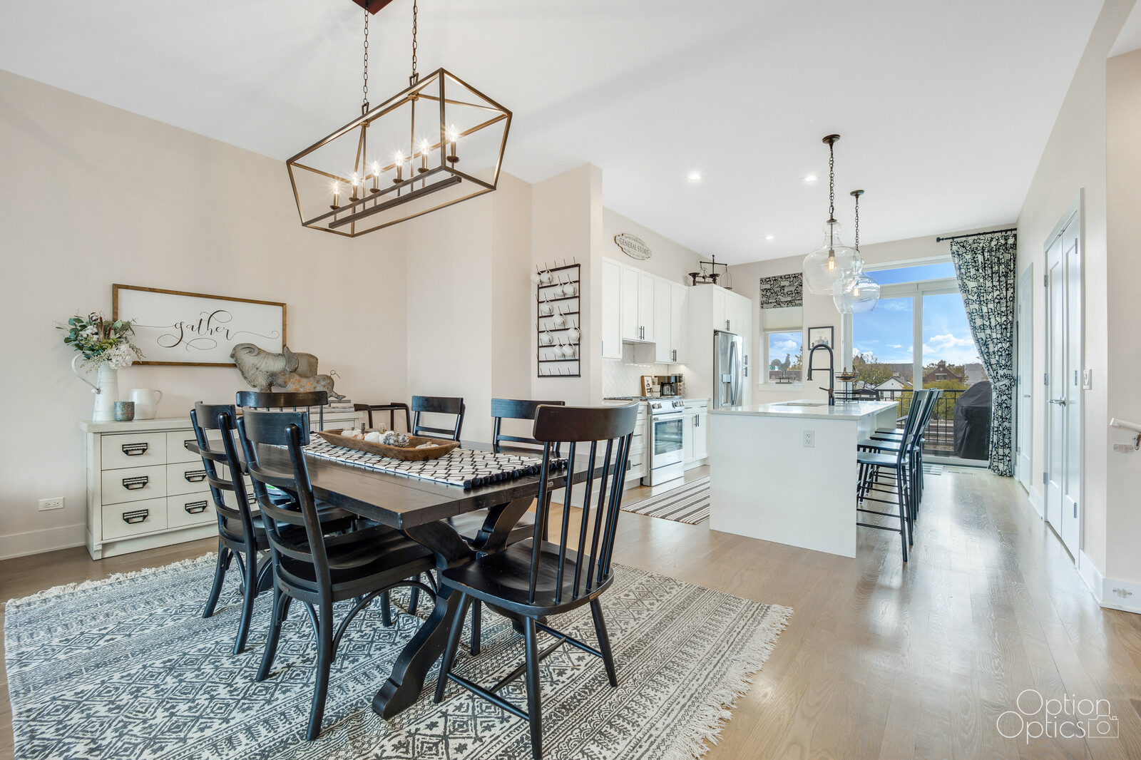 733 West 15th Street Chicago, IL 60607 - Photo 12 of 34 a view of a dining room with furniture a chandelier and wooden floor
