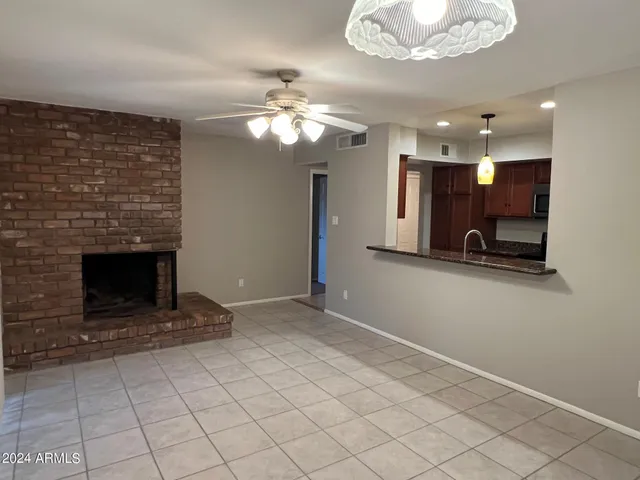 a view of a livingroom with a fireplace