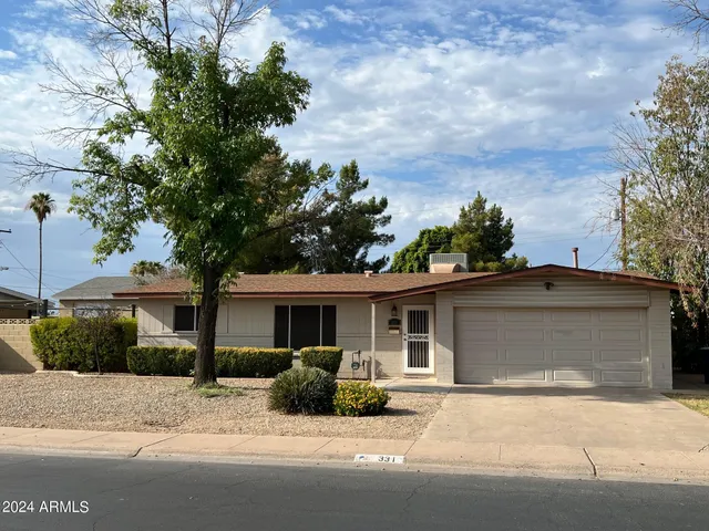 a view of a house with a outdoor space