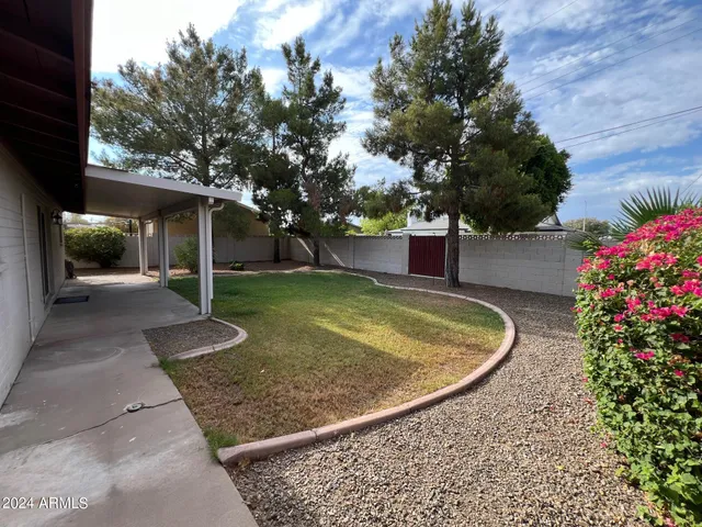 a view of a backyard with a garden