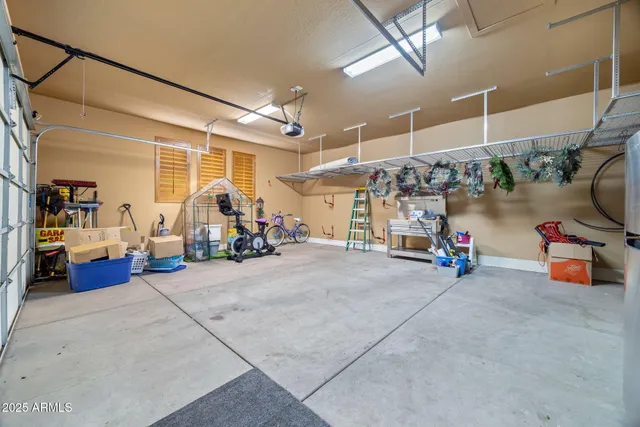 a view of a garage with a bike and car