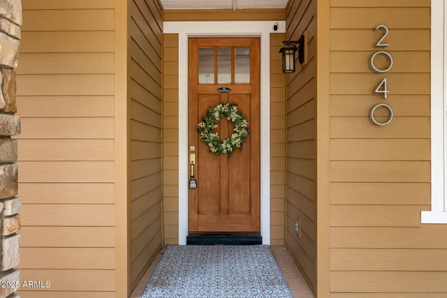 a view of a balcony with wooden floor