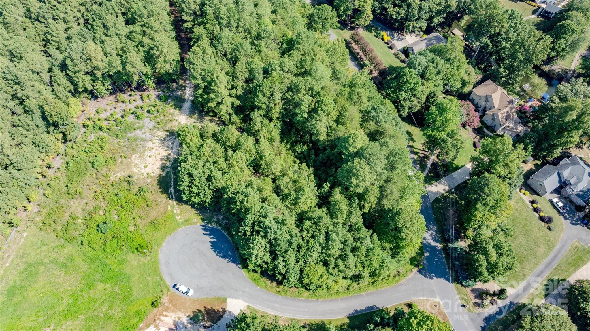 122 Ridgetop Road, Unit 4 Mooresville, NC 28117 - Photo 5 of 11 a view of a garden