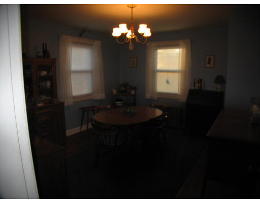 12 Rosa Road Middletown, RI 02842 - Photo 3 of 14 a bathroom with a sink vanity and a mirror