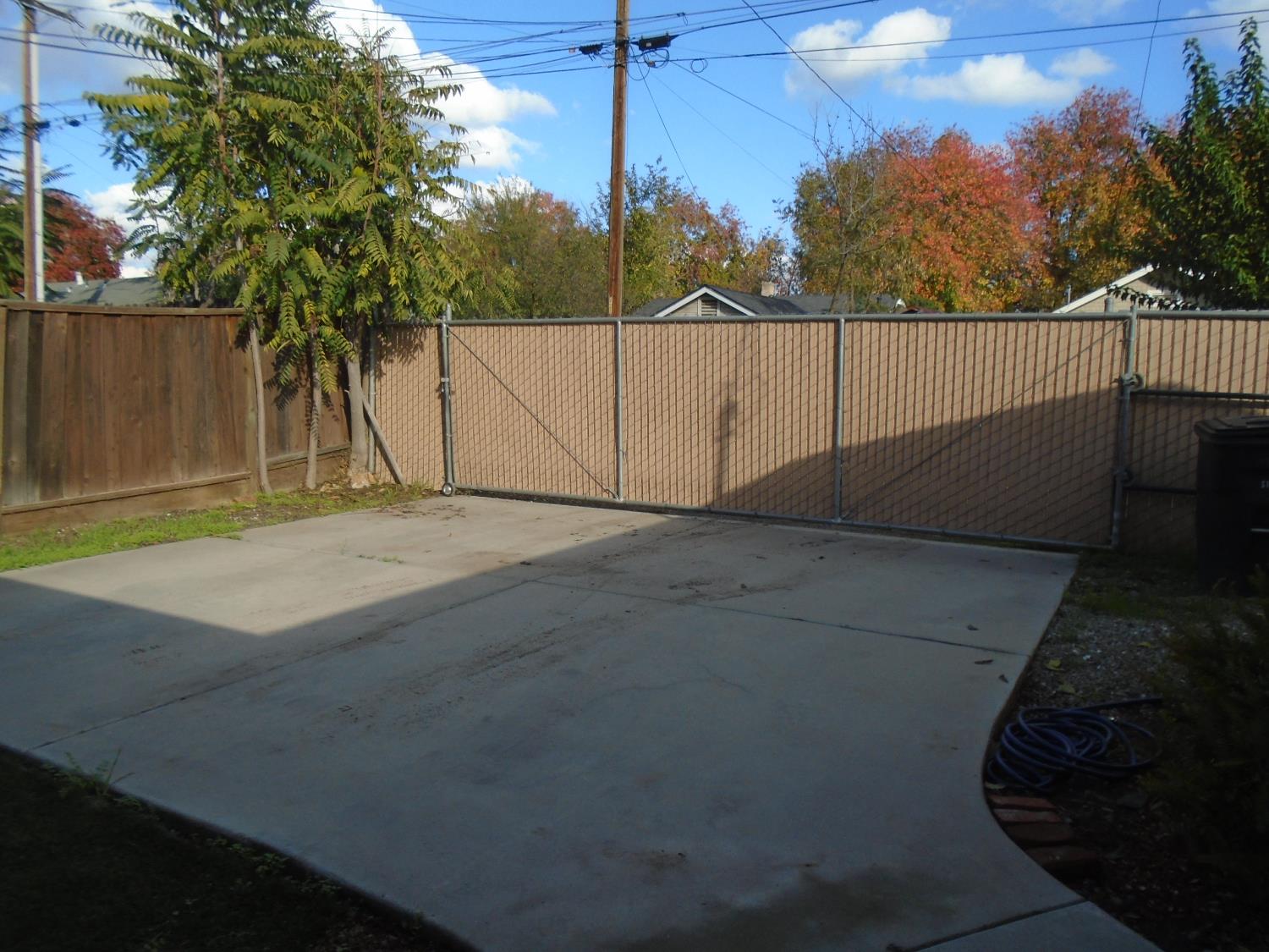322 Johnson Street Modesto, CA 95354 - Photo 4 of 6 a view of a backyard