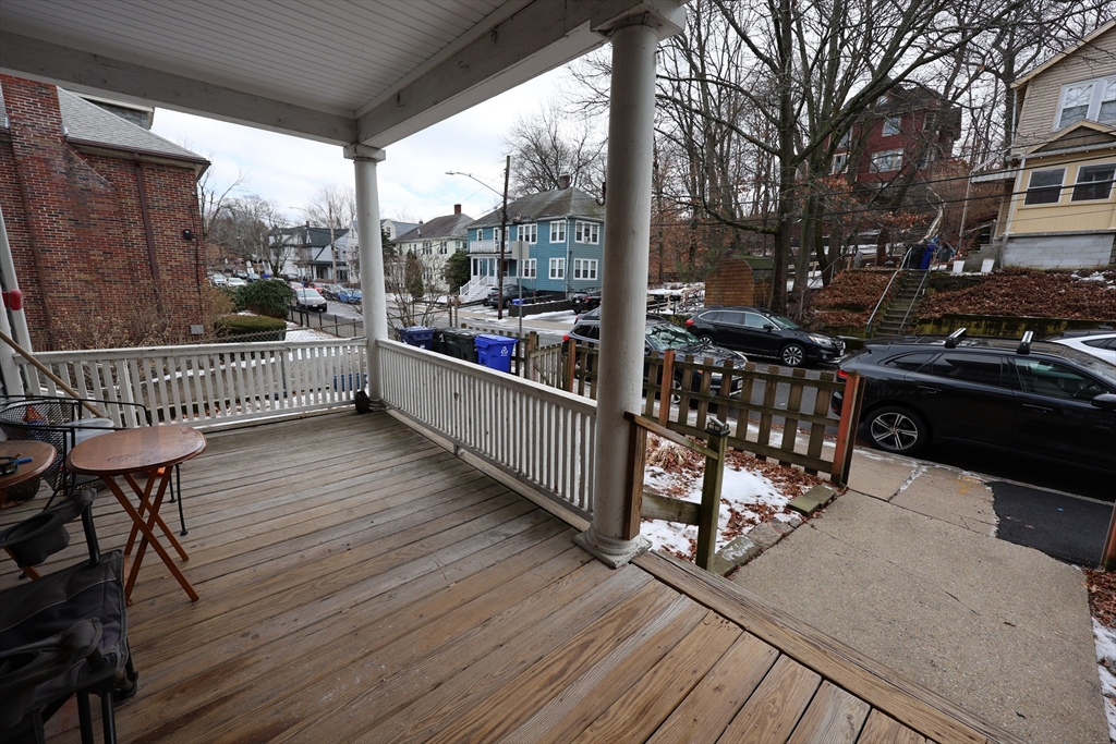 33-35 Ridgemont Street, Unit 1 Boston, MA 02134 - Photo 8 of 10 a view of a balcony with wooden floor