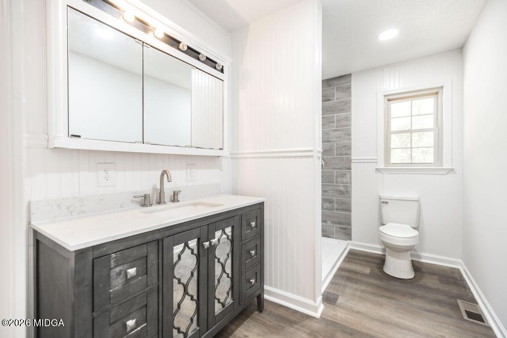 303 Woodhaven Road Centerville, GA 31028 - Photo 20 of 35 a bathroom with a sink and a toilet