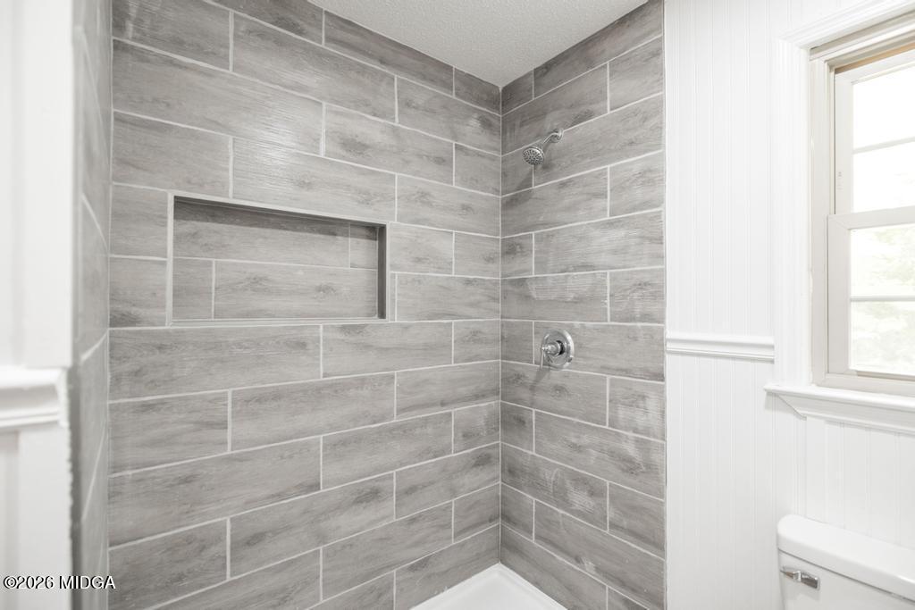 303 Woodhaven Road Centerville, GA 31028 - Photo 21 of 35 a bathroom with a shower