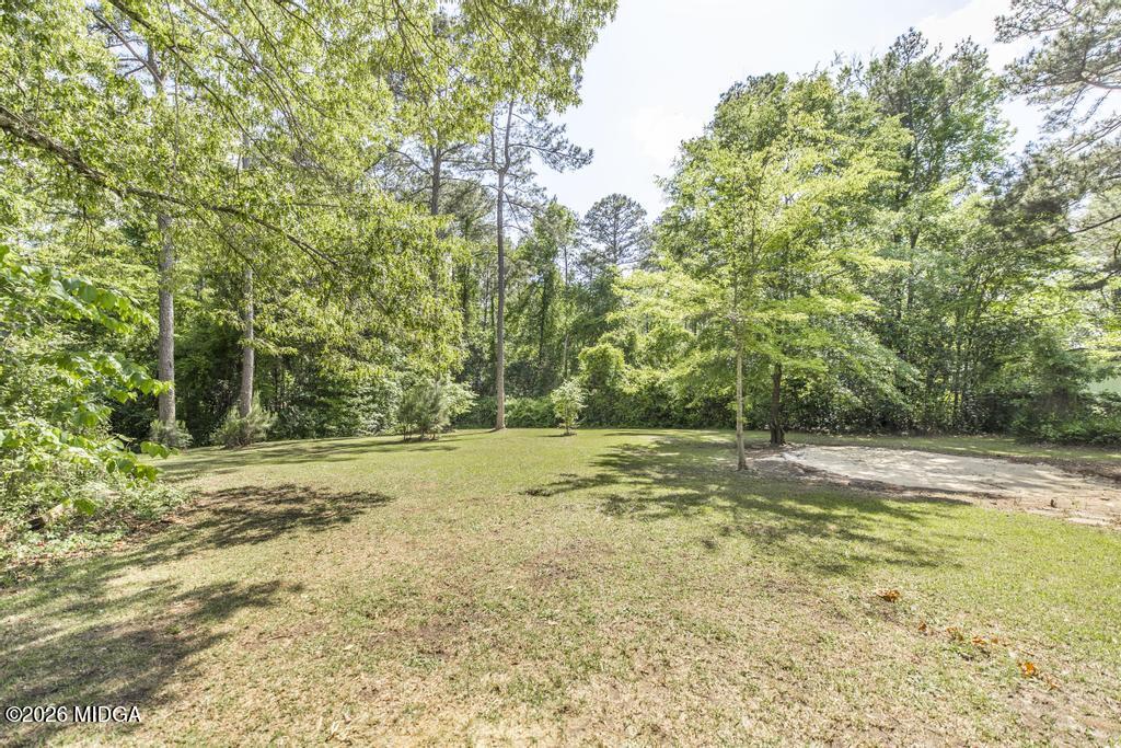 303 Woodhaven Road Centerville, GA 31028 - Photo 34 of 35 a view of a yard with trees