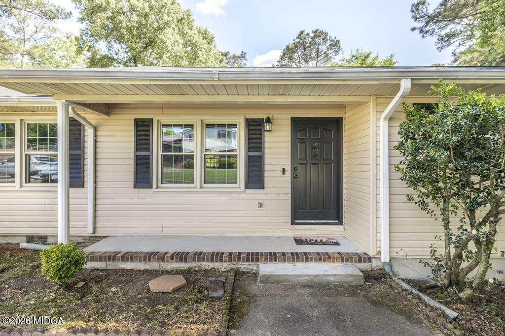 303 Woodhaven Road Centerville, GA 31028 - Photo 6 of 35 a view of a house with a window and sitting area