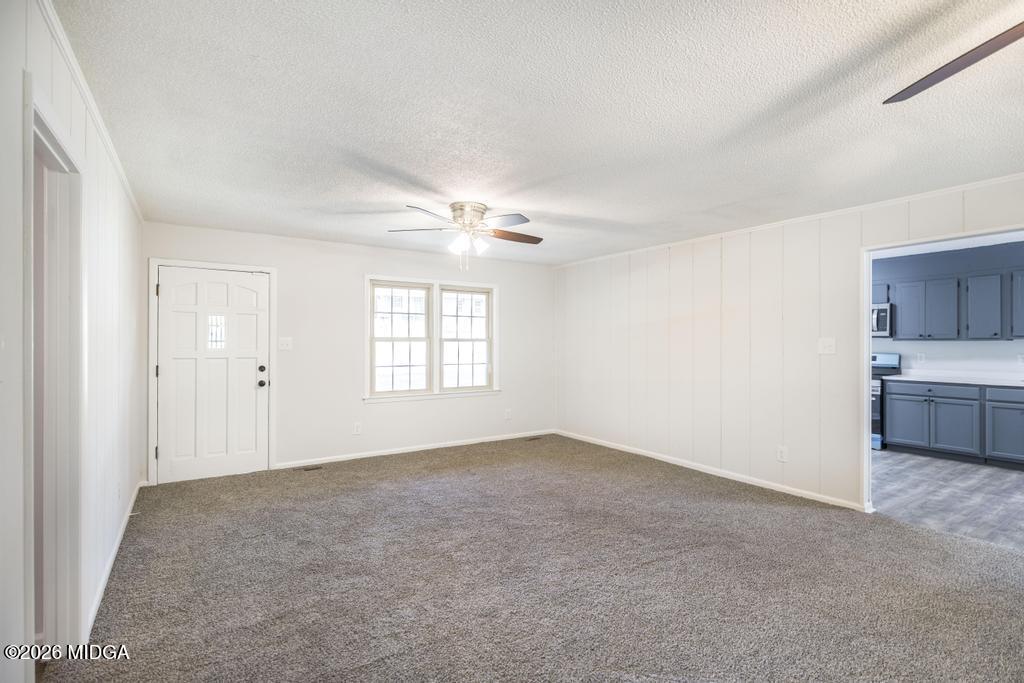 303 Woodhaven Road Centerville, GA 31028 - Photo 8 of 35 a view of an empty room with a window