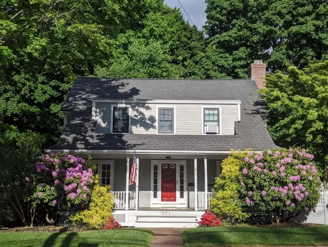 front view of house with a yard