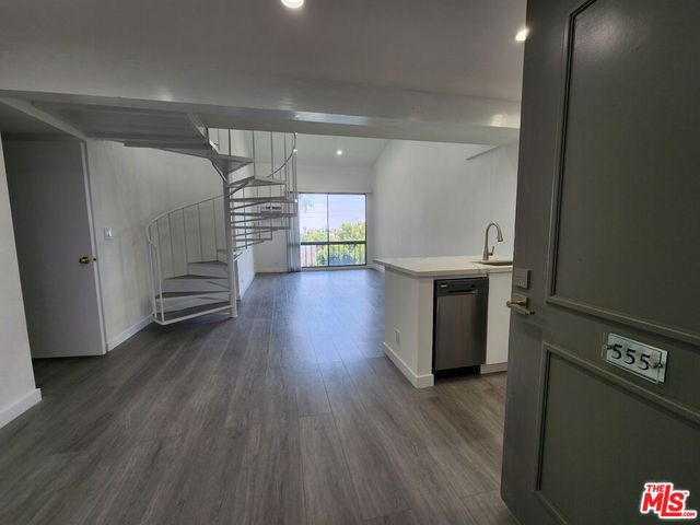 a view of a house with swimming pool