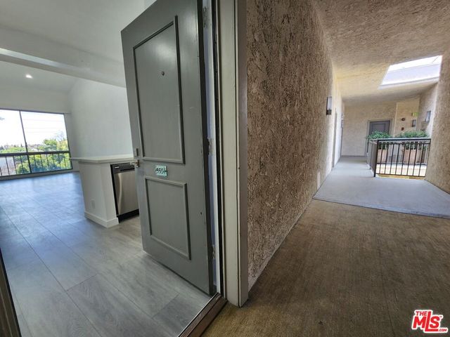 a view of swimming pool from a balcony