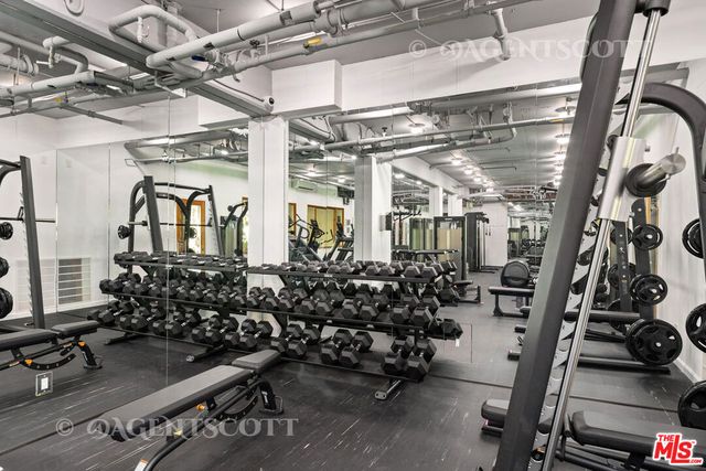an aerial view of residential houses with city view