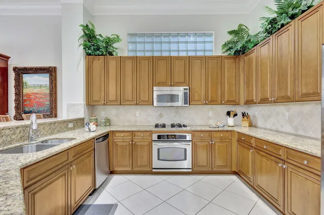 a bathroom with a bathtub shower sink and mirror