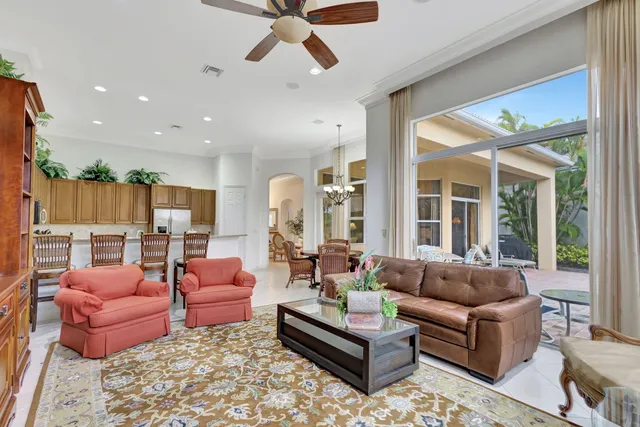 a bedroom with two beds and painting on the wall