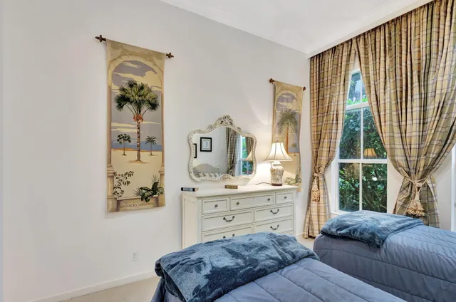 a view of a garden with an outdoor seating