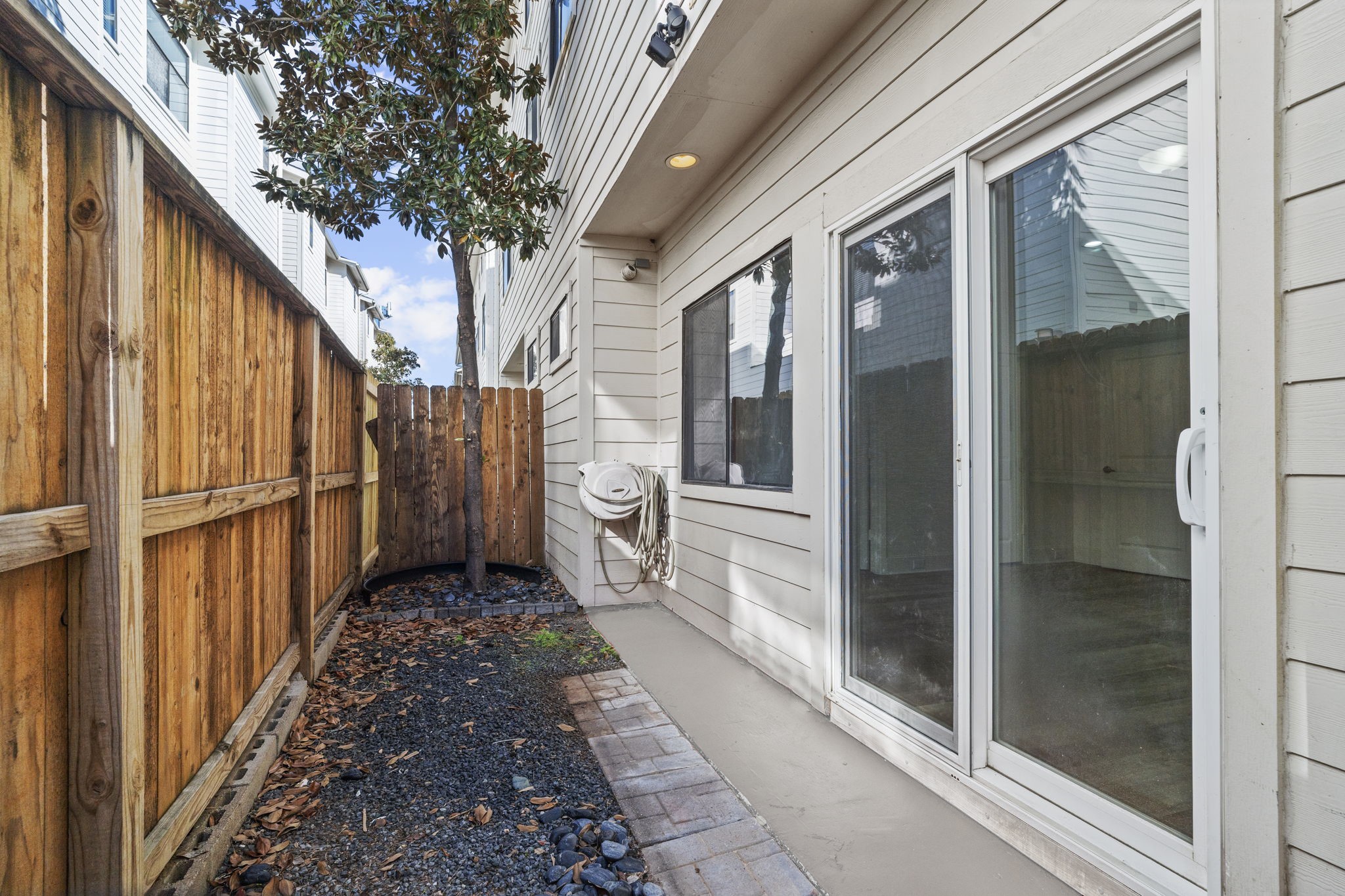 2547 Rusk Street Houston, TX 77003 - Photo 18 of 22 a porch with sliding door and glass door