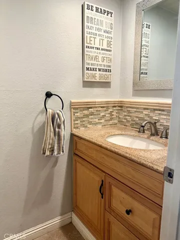 a view of a sink and a mirror