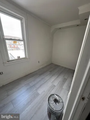 a view of entryway with washer and dryer
