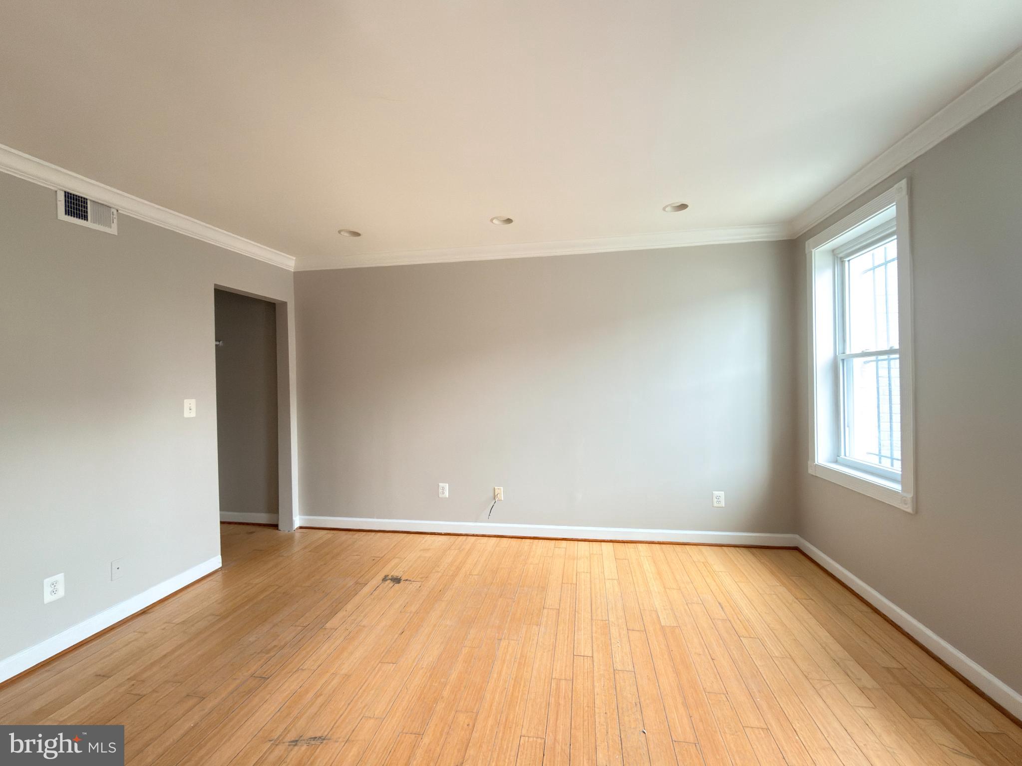 1246 Queen Street Northeast, Unit 2 Washington, DC 20002 - Photo 2 of 23 Bright and airy space with warm wood floors.