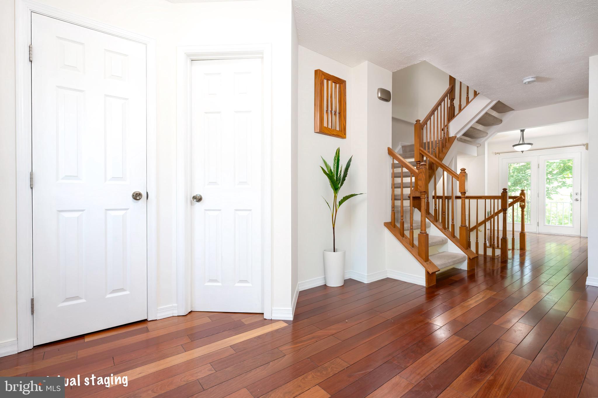 5490 Prince William Court Frederick, MD 21703 - Photo 2 of 25 Welcoming foyer with coat closet and powder room
