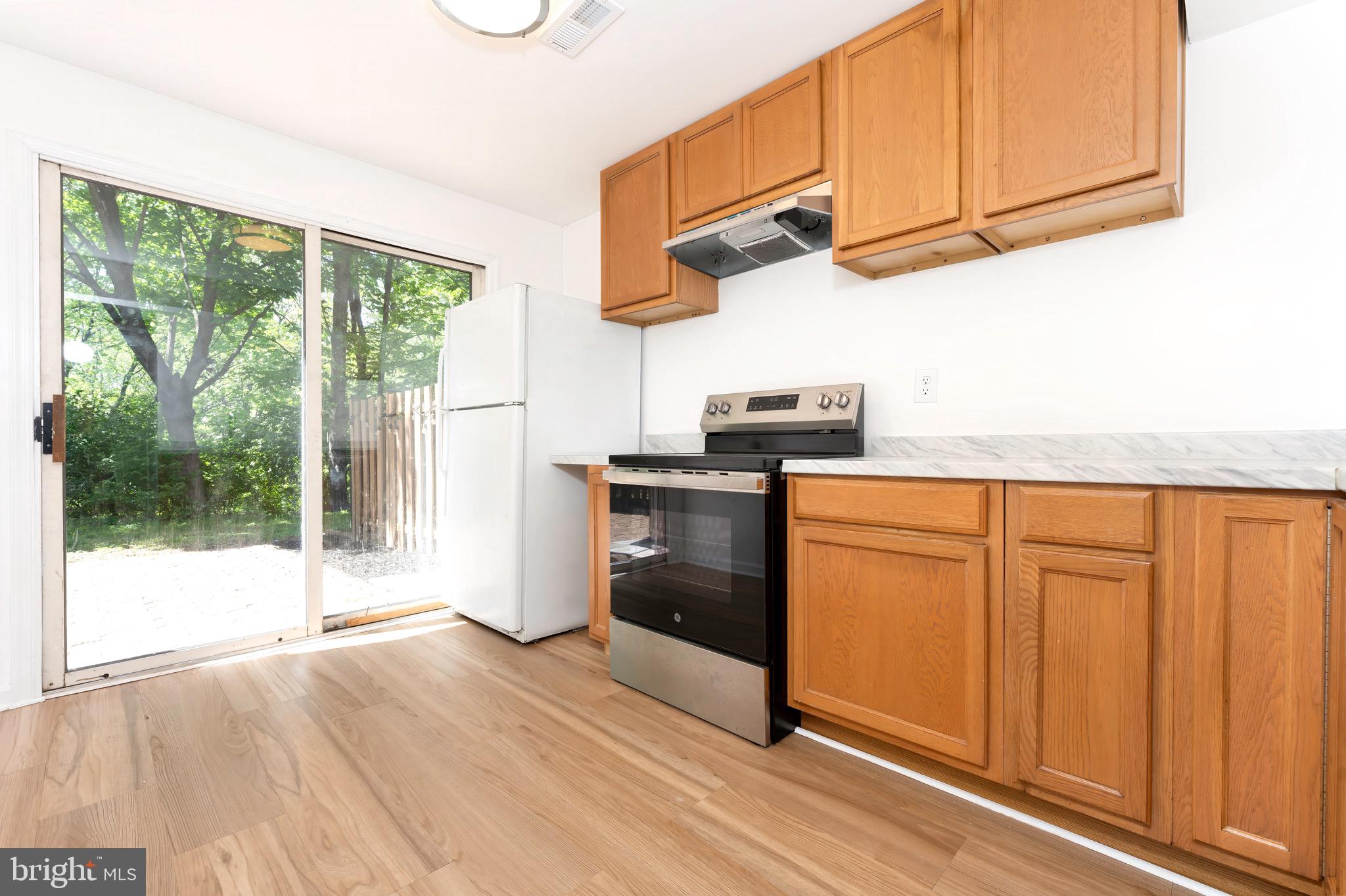 5490 Prince William Court Frederick, MD 21703 - Photo 22 of 25 Lower level kitchen