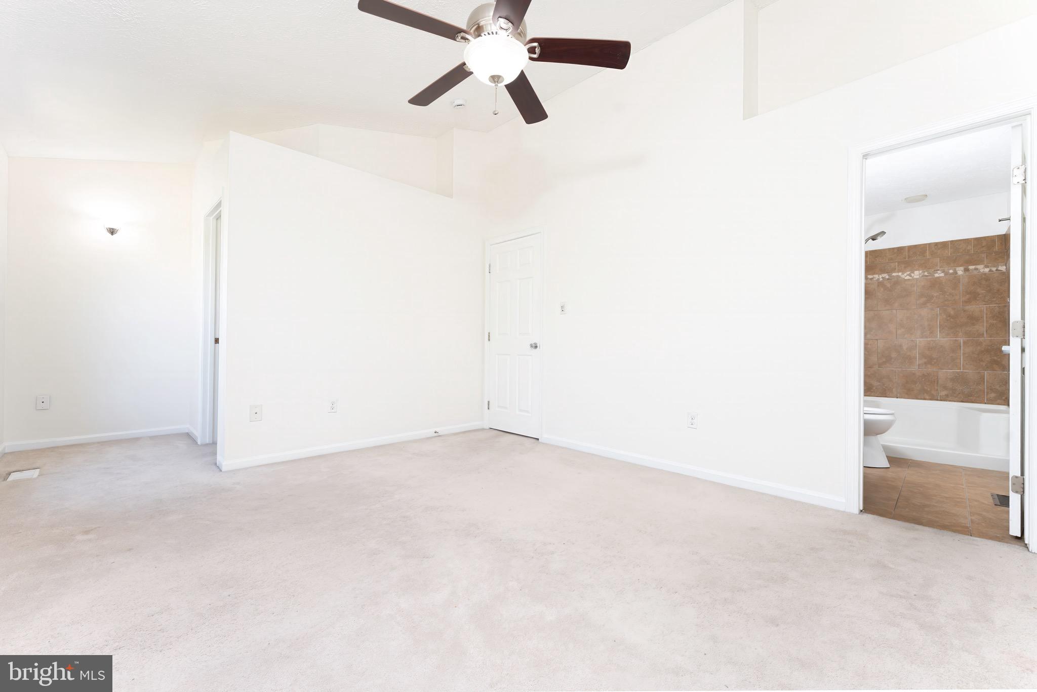 5490 Prince William Court Frederick, MD 21703 - Photo 23 of 25 Primary suite, cathedral ceiling, WI closet, FB