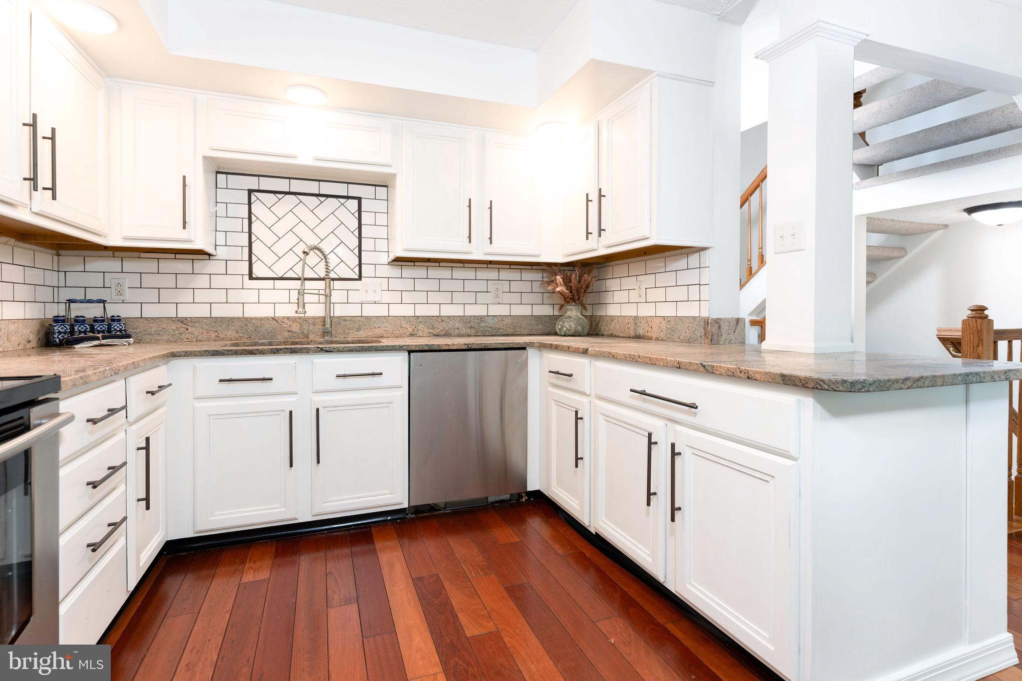 5490 Prince William Court Frederick, MD 21703 - Photo 7 of 25 Remodeled granite and stainless steel kitchen