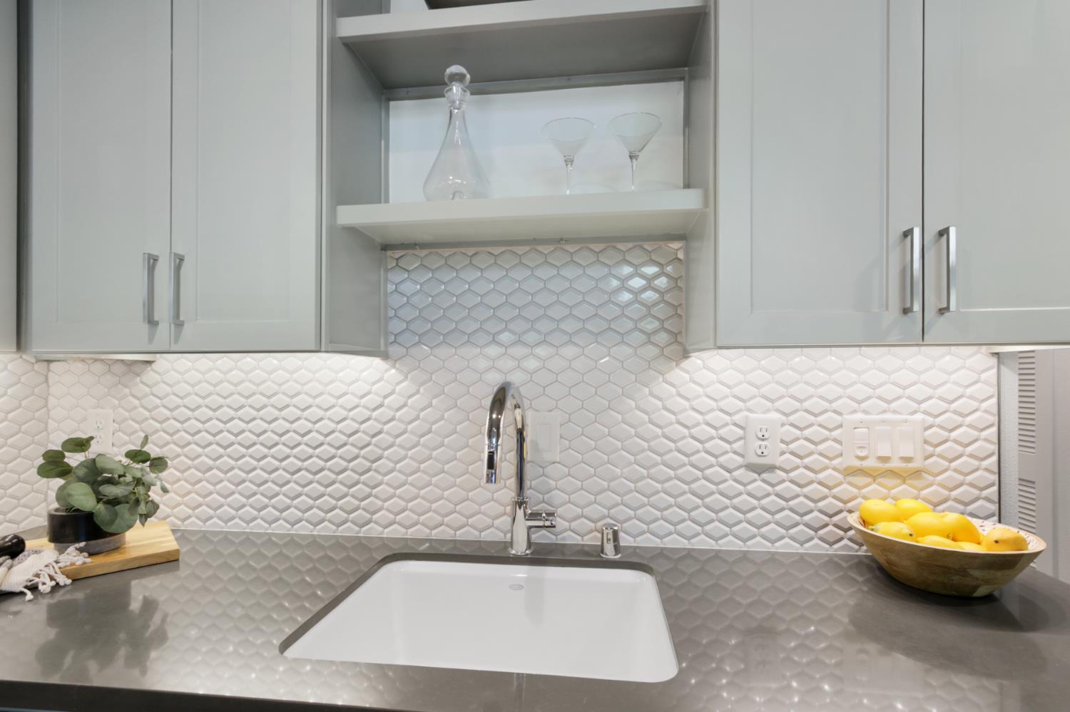 2746 5th Street Davis, CA 95618 - Photo 17 of 61 a bathroom with a sink and a mirror