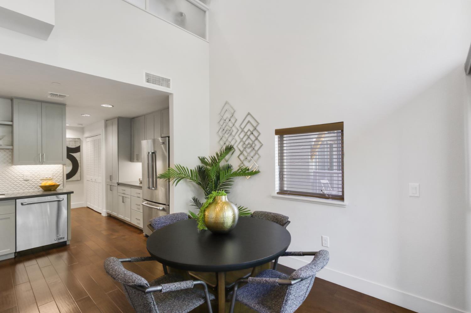 2746 5th Street Davis, CA 95618 - Photo 18 of 61 a living room with furniture and a potted plant