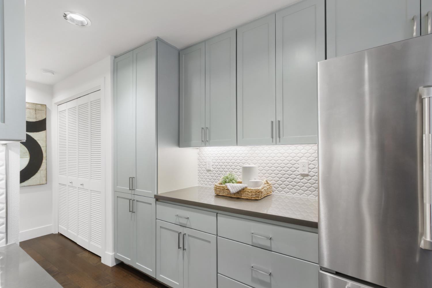 2746 5th Street Davis, CA 95618 - Photo 21 of 61 a bathroom with a granite countertop sink and shower