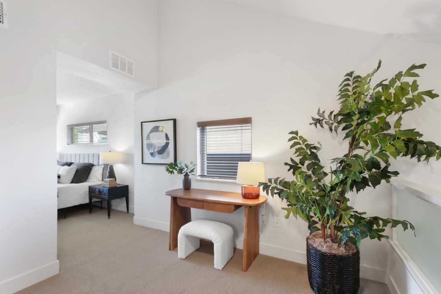 2746 5th Street Davis, CA 95618 - Photo 26 of 61 a living room with furniture a potted plant and a potted plant