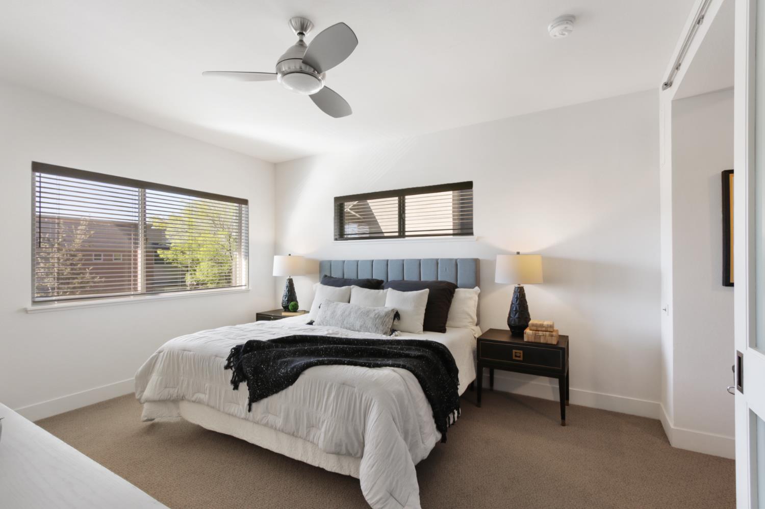 2746 5th Street Davis, CA 95618 - Photo 28 of 61 a bedroom with a bed and painting on the wall