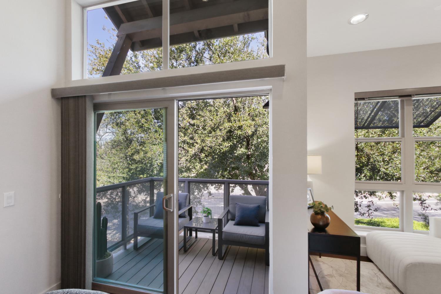 2746 5th Street Davis, CA 95618 - Photo 10 of 61 a living room with furniture and a large window