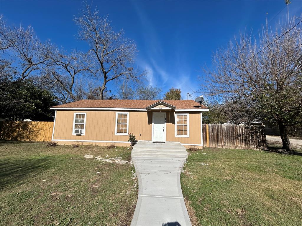 602 Ella Street Dublin, TX 76446 - Photo 10 of 13 a view of a house with a yard