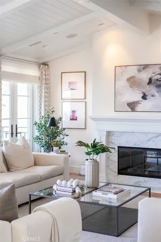 a kitchen with a sink a stove and cabinets