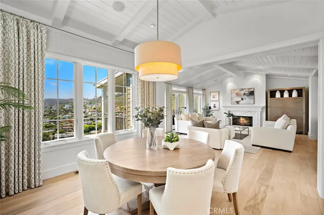 a bathroom with a shower sink vanity mirror and toilet