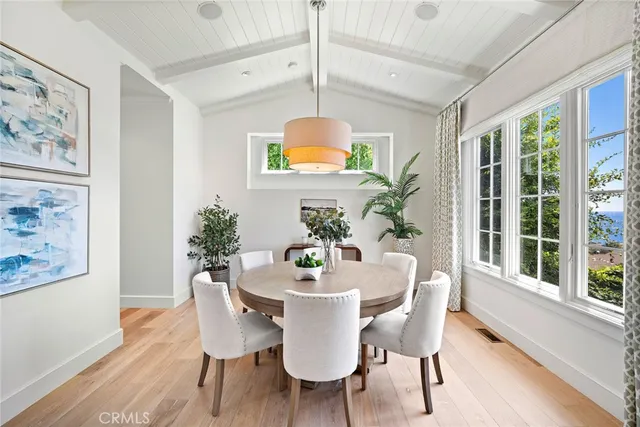 a living room with furniture fireplace and a flat screen tv